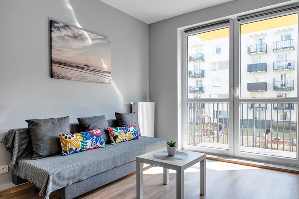 Departamento Confort, 1 cama King size y sofá cama | Sala de estar | Televisión de pantalla plana 