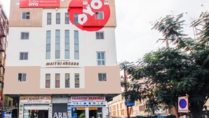 A building with signs for 'Hotel Priya Residency' and 'Maitri Arcade'. - OYO 15140 Hotel Priya Residency (Hyderabad)