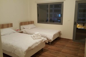 Appartement, 3 slaapkamers | Een strijkplank/strijkijzer, gratis wifi, beddengoed