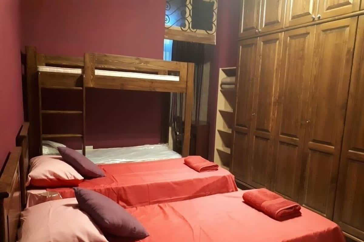 Family Quadruple Room | Blackout drapes, iron/ironing board, WiFi (free), individually decorated