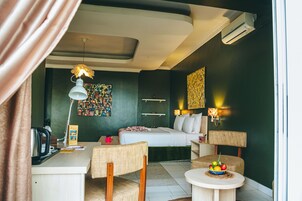 Suíte premium, 1 cama King, vista para a cidade | Roupas de cama de algodão egípcio, roupas de cama premium