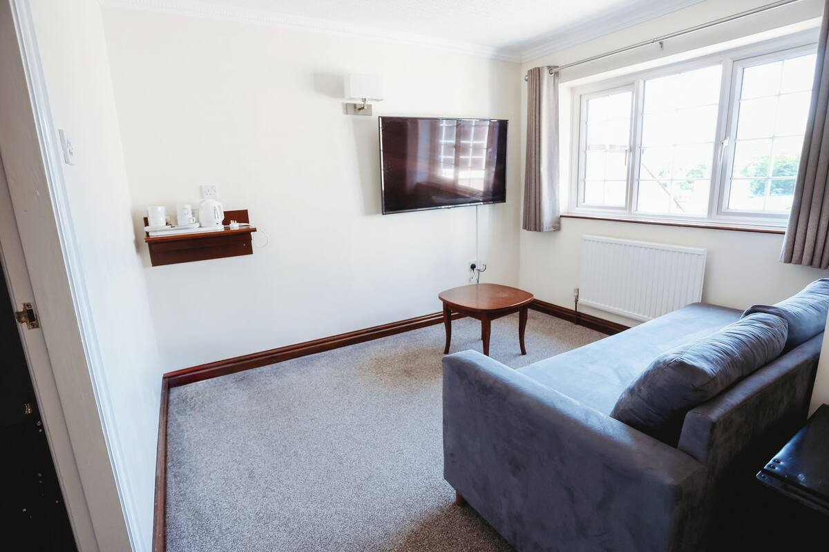 family room | desk, laptop workspace, iron/ironing board, free wifi