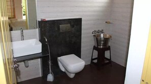 Habitación Premium, varias camas | Baño | Regadera
