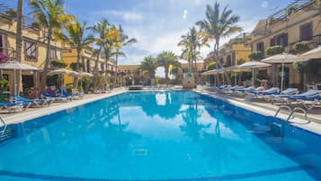 Outdoor pool, a heated pool, pool umbrellas, sun loungers