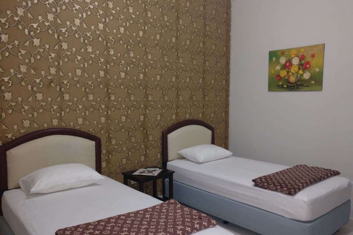 Chambre Deluxe avec lits jumeaux