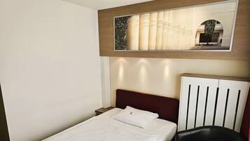 Einzelzimmer | Minibar, Zimmersafe, Schreibtisch, laptopgeeigneter Arbeitsplatz