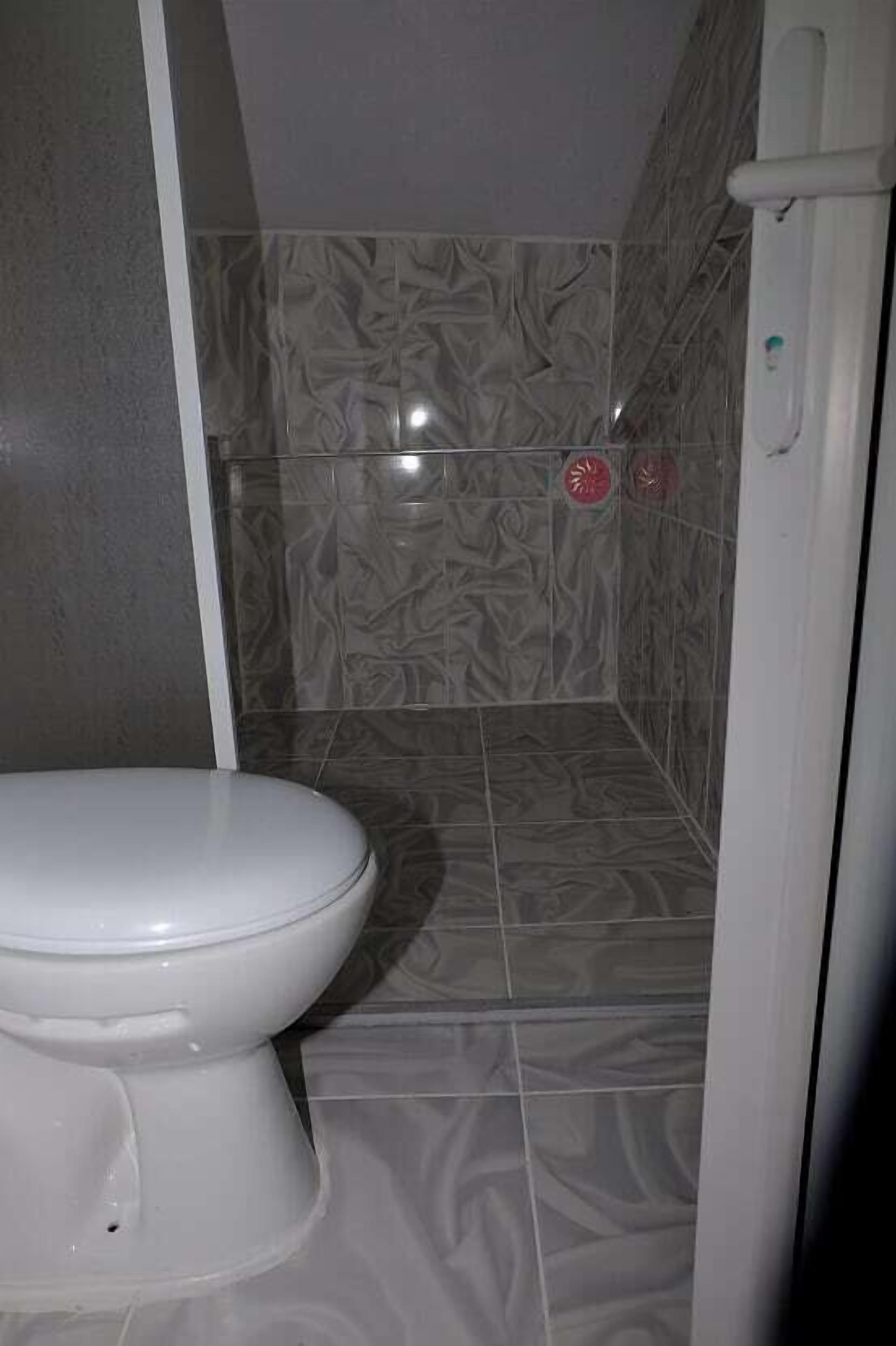 family room | bathroom | free toiletries, hair dryer, slippers, towels