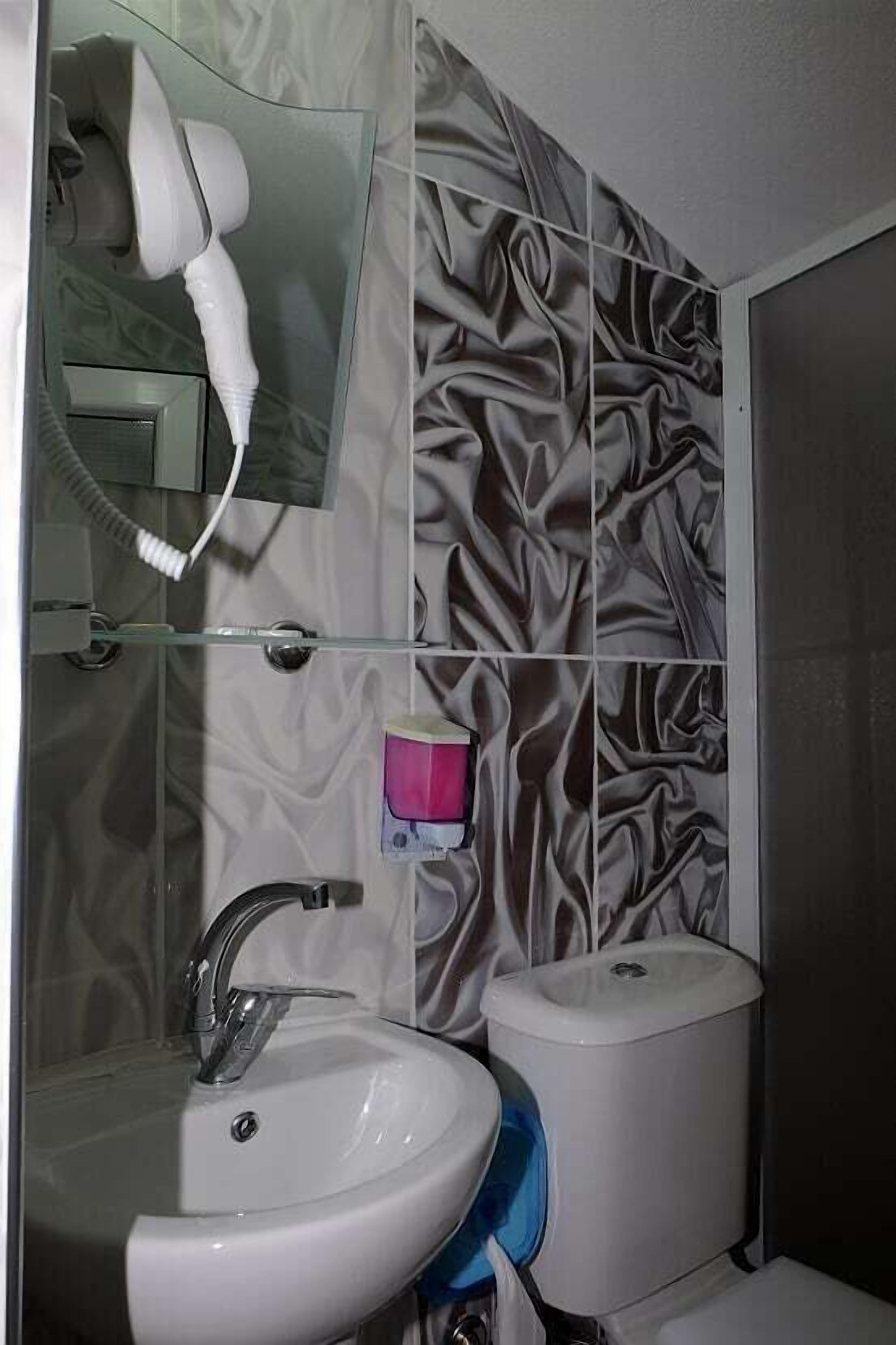 family room | bathroom | free toiletries, hair dryer, slippers, towels