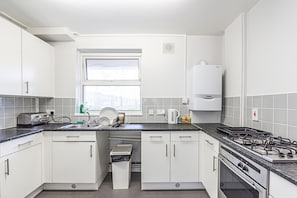 Apartment, 1 Schlafzimmer | Eigene Küche | Großer Kühlschrank, Mikrowelle, Ofen, Herdplatte