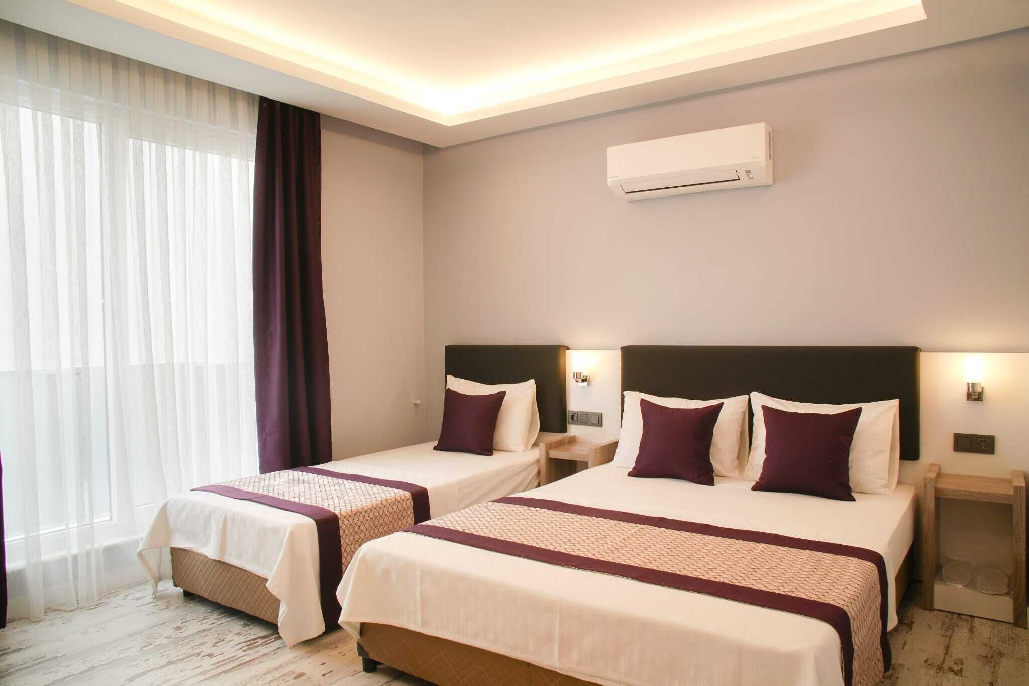 Standard Triple Room | Frette Italian sheets, premium bedding, minibar, desk