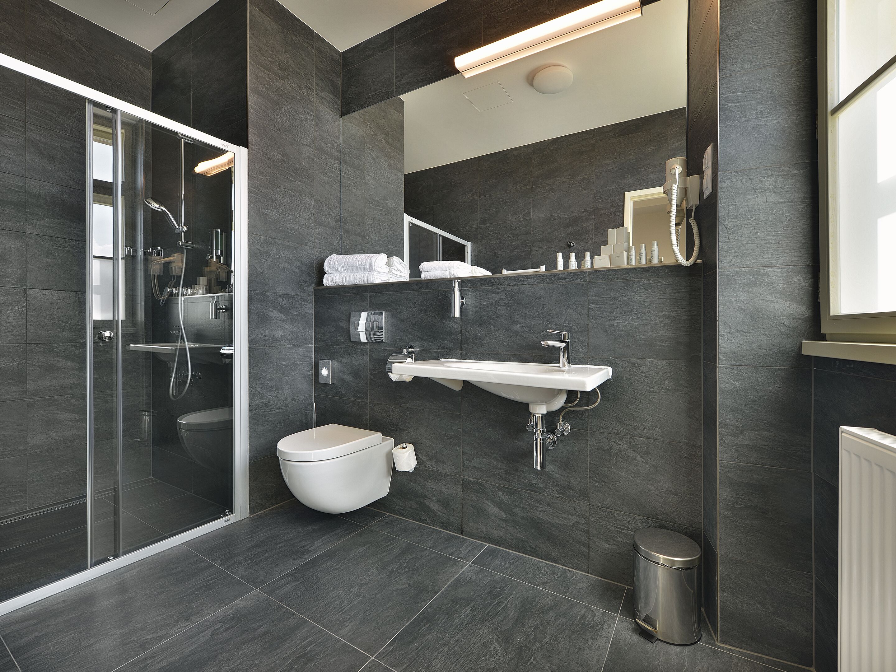 junior suite | bathroom | free toiletries, hair dryer, bathrobes, slippers