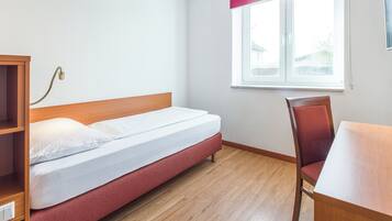 Classic-Einzelzimmer | Minibar, Verdunkelungsvorhänge, schallisolierte Zimmer