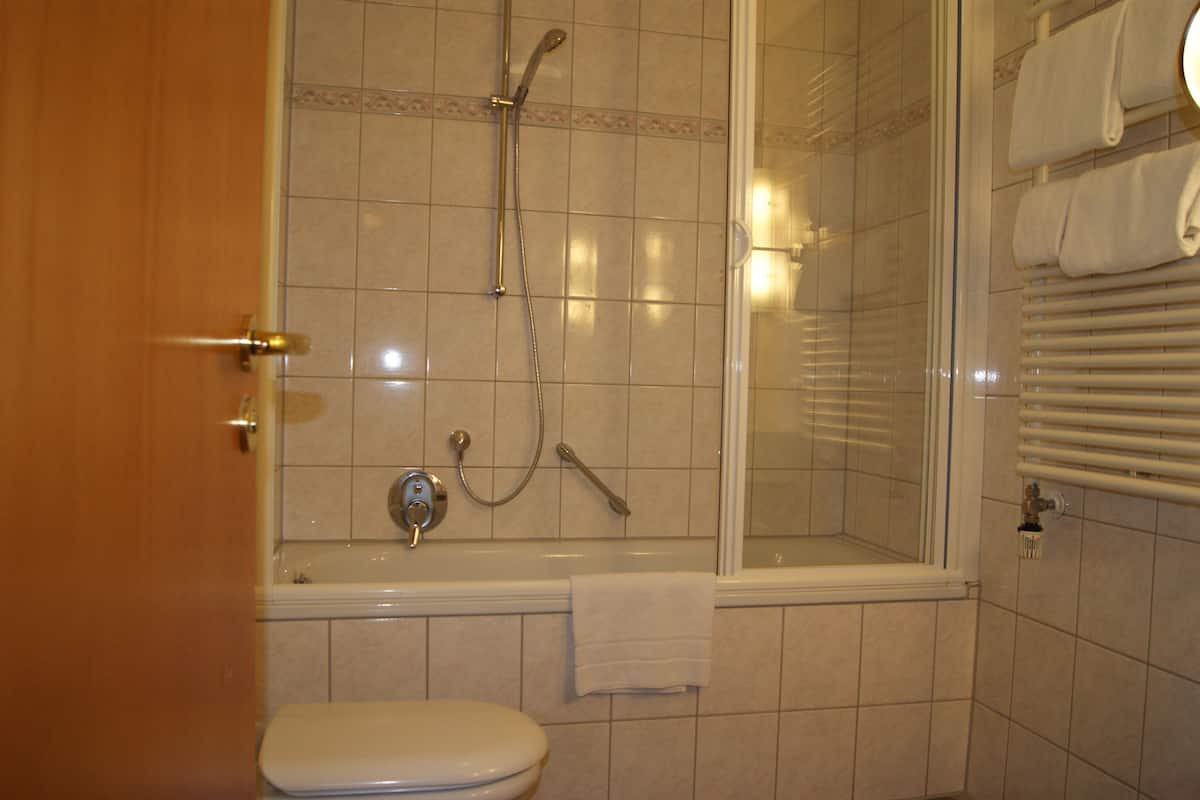 family room | bathroom | shower, hair dryer, towels