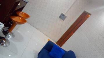 Comfort Studio, 1 Bedroom | Living area | 32-inch flat-screen TV with cable channels, TV