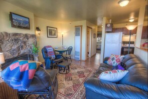 Condo, Multiple Beds, Fireplace, Mountain View | Living area | TV, fireplace
