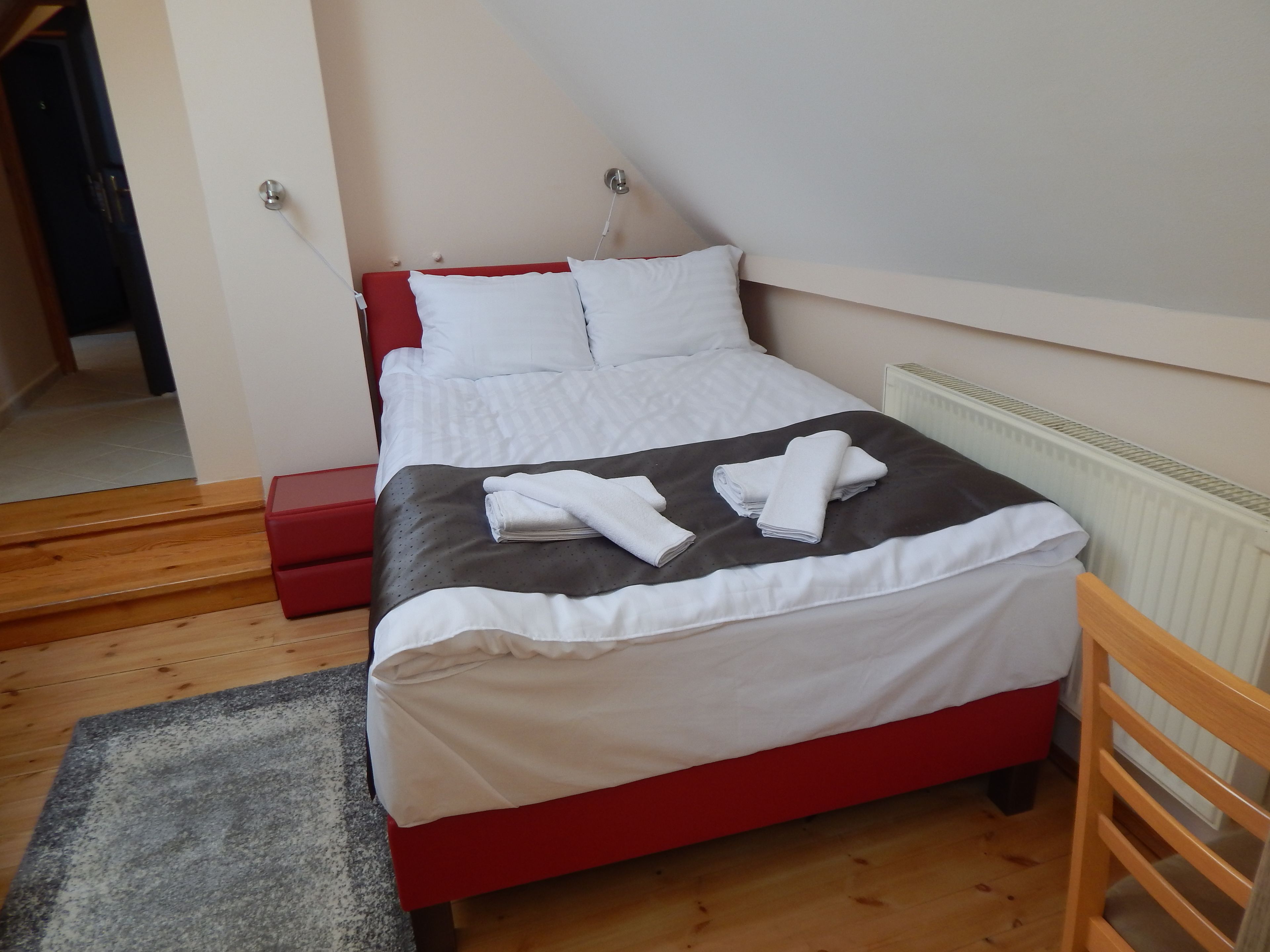 Familiekamer, meerdere bedden | Luxe beddengoed, pillowtop-bedden, een minibar, een kluis op de kamer