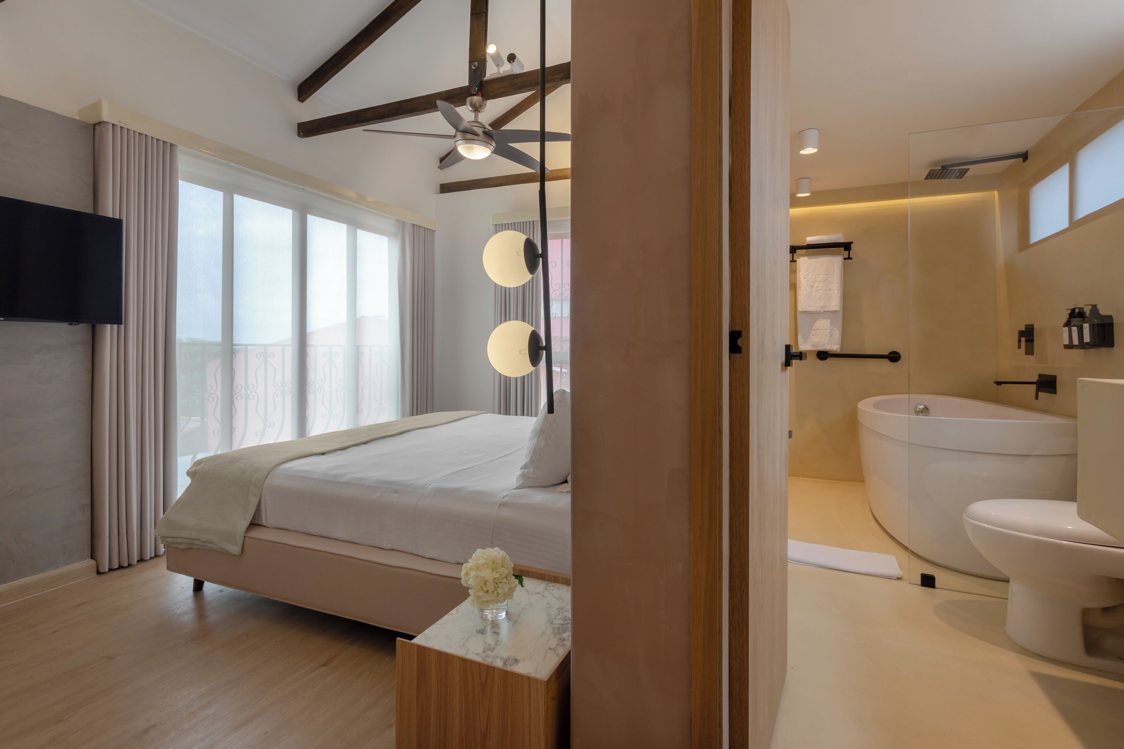 comfort room, city view | 1 bedroom, in-room safe, soundproofing, bed sheets