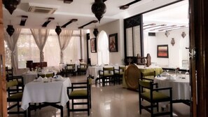 Breakfast, lunch, dinner served; local and international cuisine