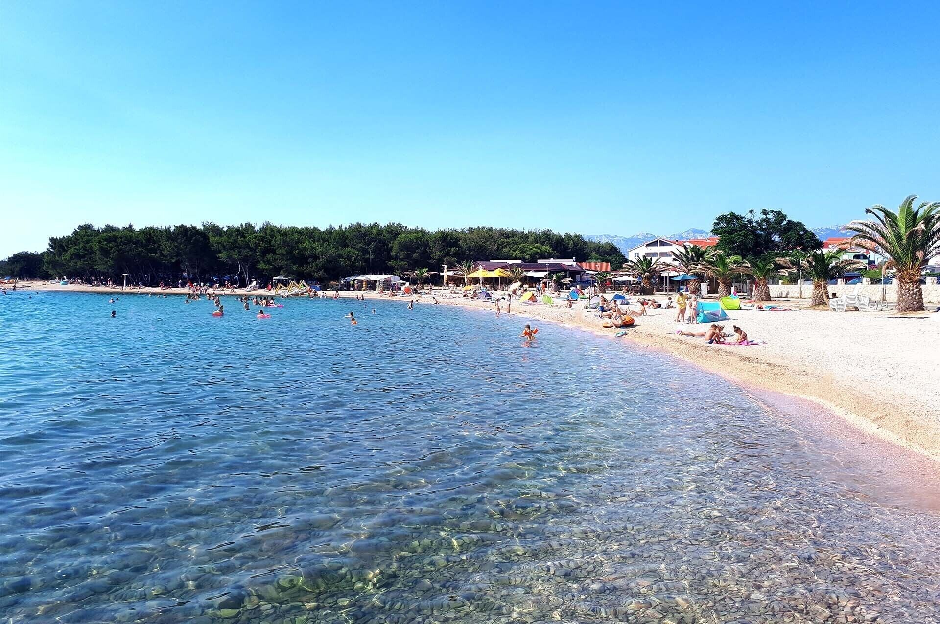 On the beach, sun loungers