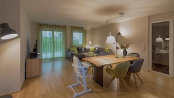 Luxury Apartment | Living area | LCD TV, video game console, DVD player, heated floors