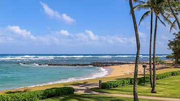On the beach, sun loungers, beach towels