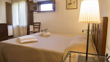 Apartment, 1 Bedroom (Terra) | Down comforters, blackout drapes, soundproofing, free cribs/infant beds