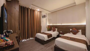 Deluxe Twin Room, Garden View | Minibar, desk, soundproofing, free WiFi