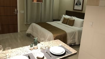 Hypo-allergenic bedding, pillow-top beds, minibar