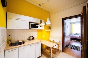 Comfort Apartment, City View (5) | Private kitchen | Full-sized fridge, microwave, coffee/tea maker, electric kettle