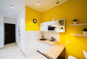 Comfort Apartment, City View (5) | Private kitchen | Full-sized fridge, microwave, coffee/tea maker, electric kettle