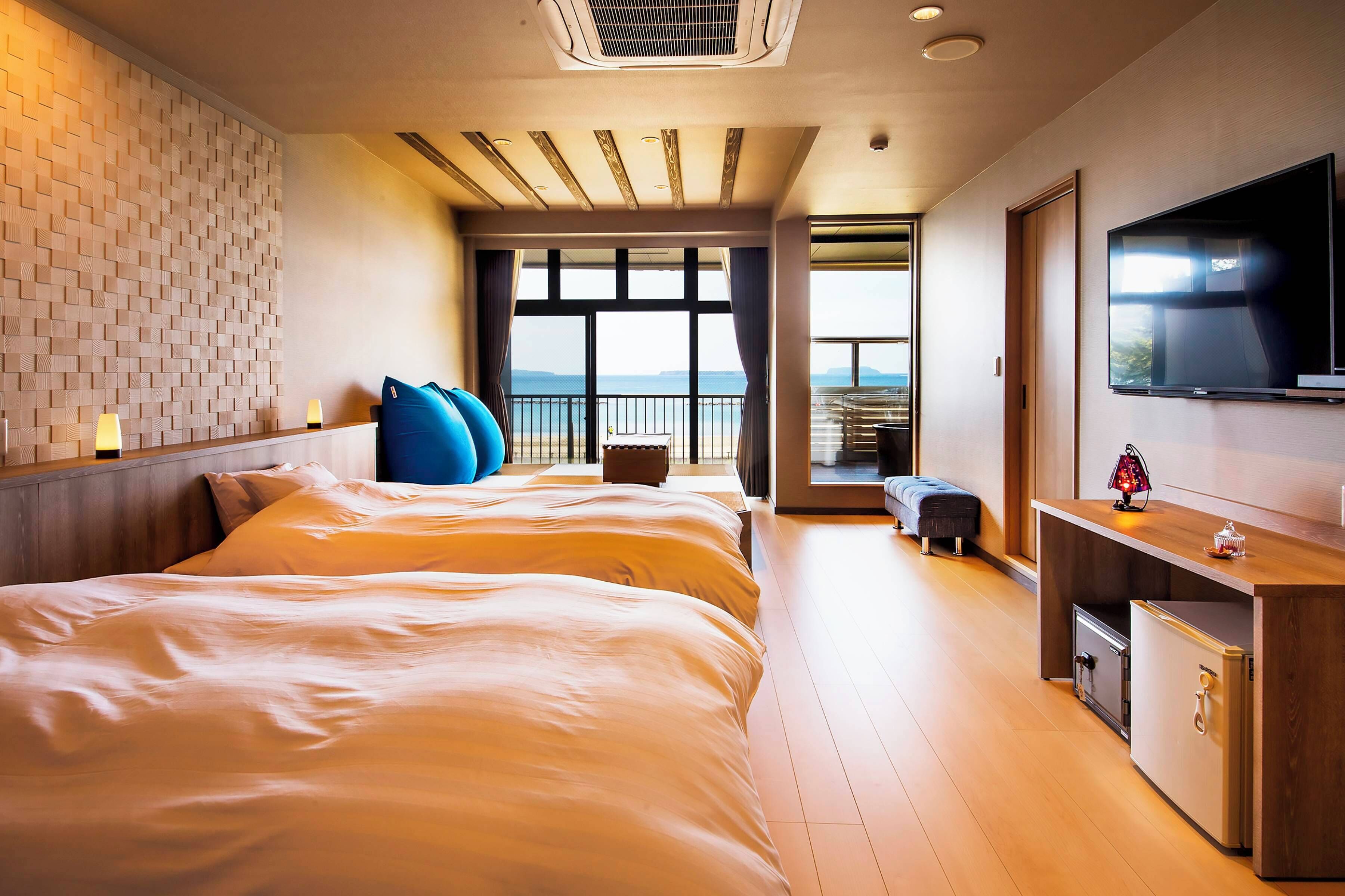Quarto quádruplo, para não fumantes, vista para o oceano | Individualmente decorados, individualmente mobiliados, escrivaninha
