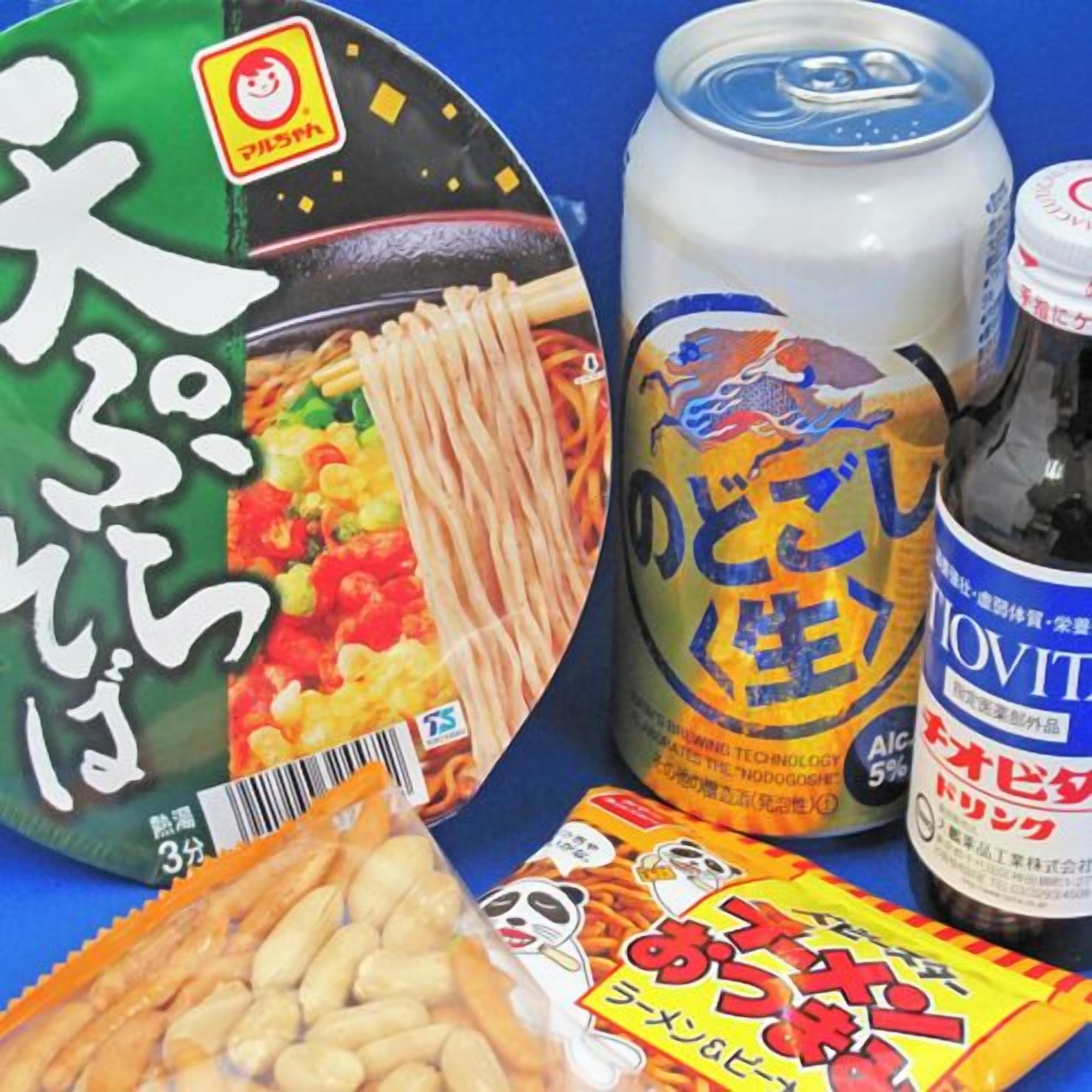 A package of instant noodles, a can of beer, and a bottle of liquor.