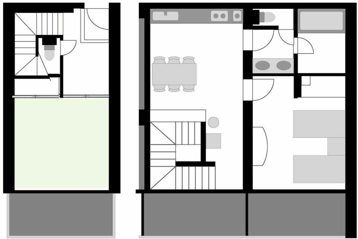 A floor plan with a kitchen area, dining space, and a bathroom.