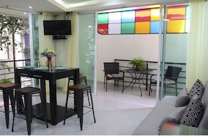 Condo, Non Smoking | Living area | Flat-screen TV, DVD player