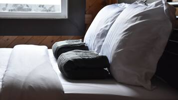 Deluxe Queen Room with Private Washroom | In-room safe, blackout curtains, free WiFi, bed sheets