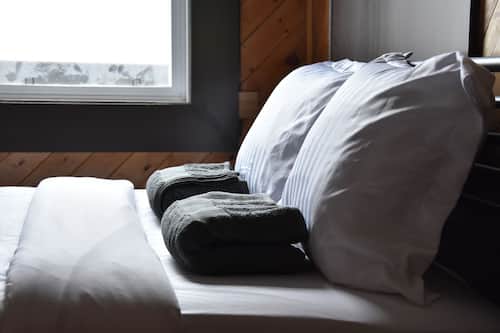 Deluxe Queen Room with Private Washroom | In-room safe, blackout drapes, free WiFi, bed sheets