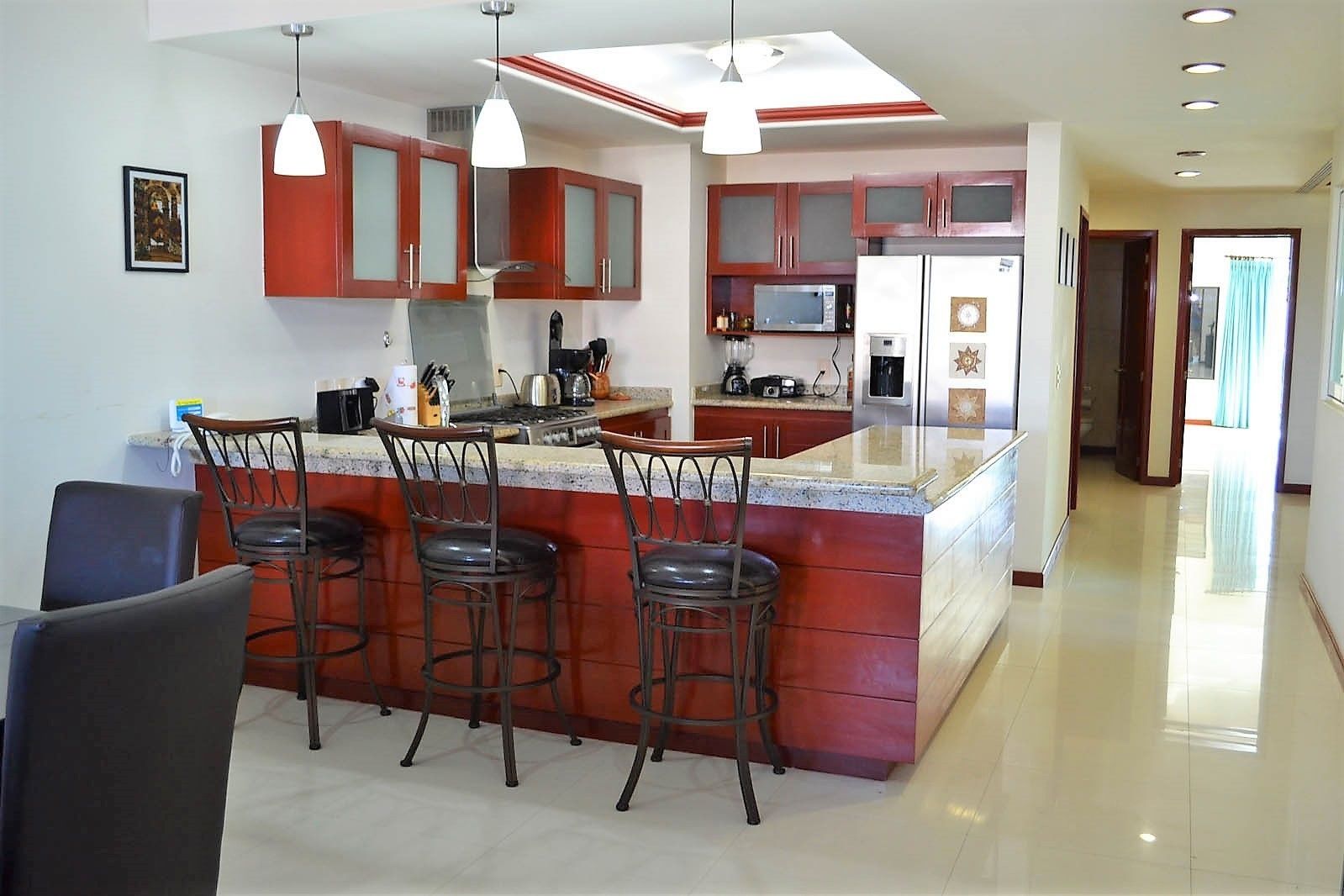 Condo, Non Smoking | Private kitchen | Full-sized fridge, microwave, oven, stovetop