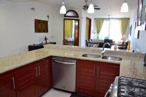 Condo, Non Smoking | Private kitchen | Full-size fridge, microwave, oven, stovetop