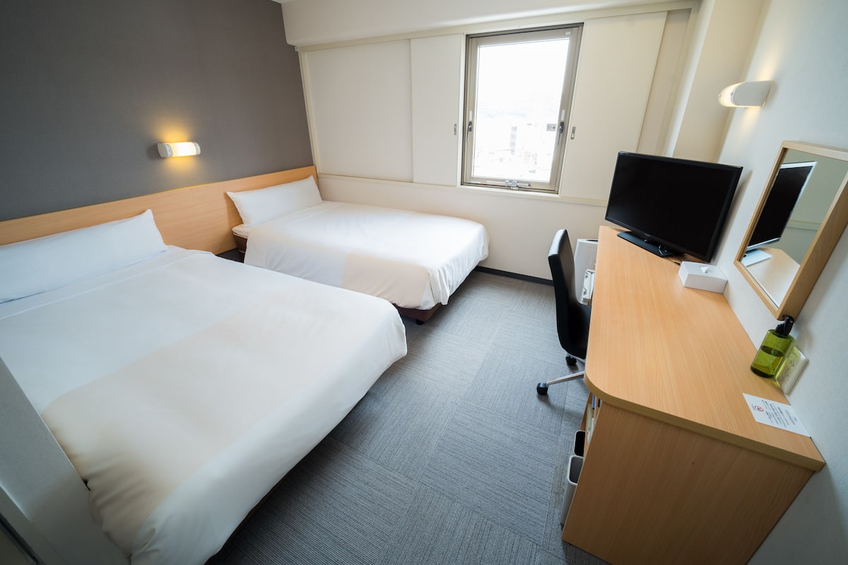 Desk, iron/ironing board, free WiFi, bed sheets