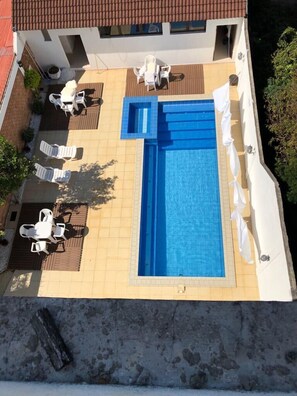 Outdoor pool, sun loungers