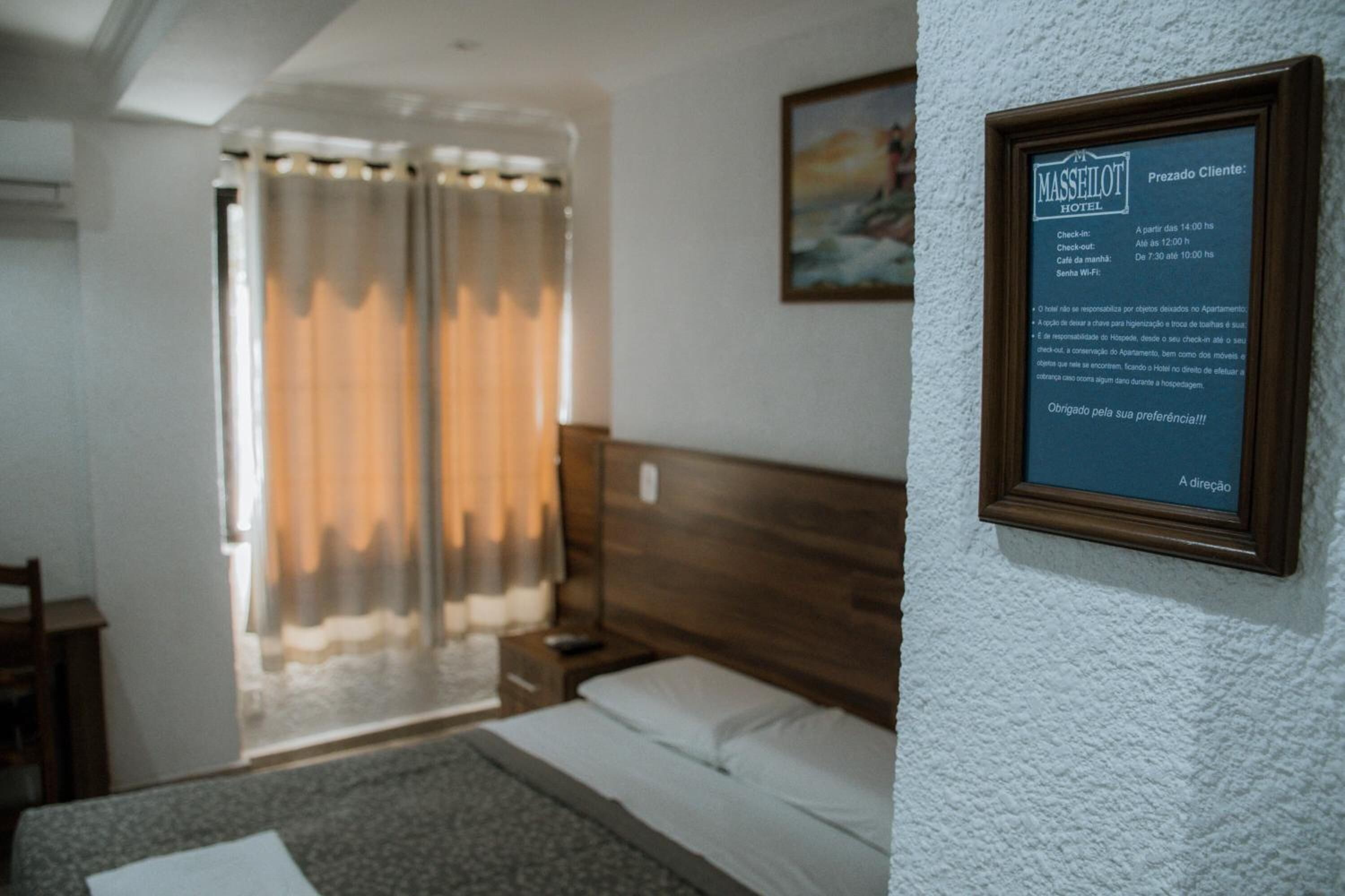 minibar, desk, blackout curtains, iron/ironing board