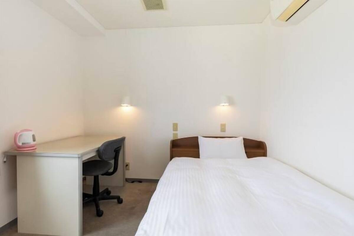 Desk, WiFi (free), bed sheets