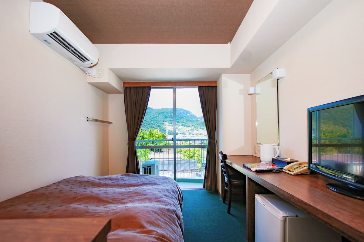 Economy Simi-Double Room - Shower Only - Non-Smoking | Free WiFi, bed sheets