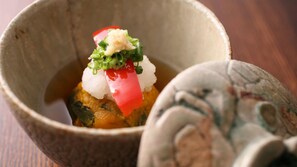 A bowl of food with a spoon. - Kyoya (Takayama)