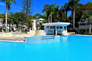 A swimming pool with a bar area labeled 'Bar Pool' and 'Tropical Casa'.