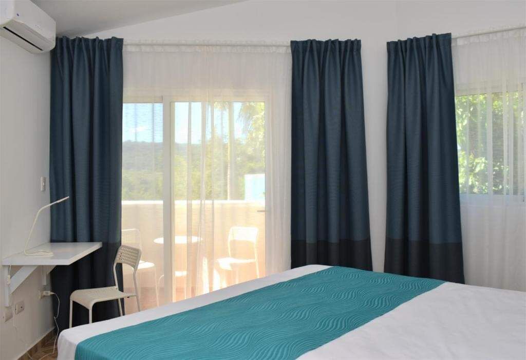 standard double room, 1 king bed, mountain view | hypo-allergenic bedding, in-room safe, soundproofing, iron/ironing board