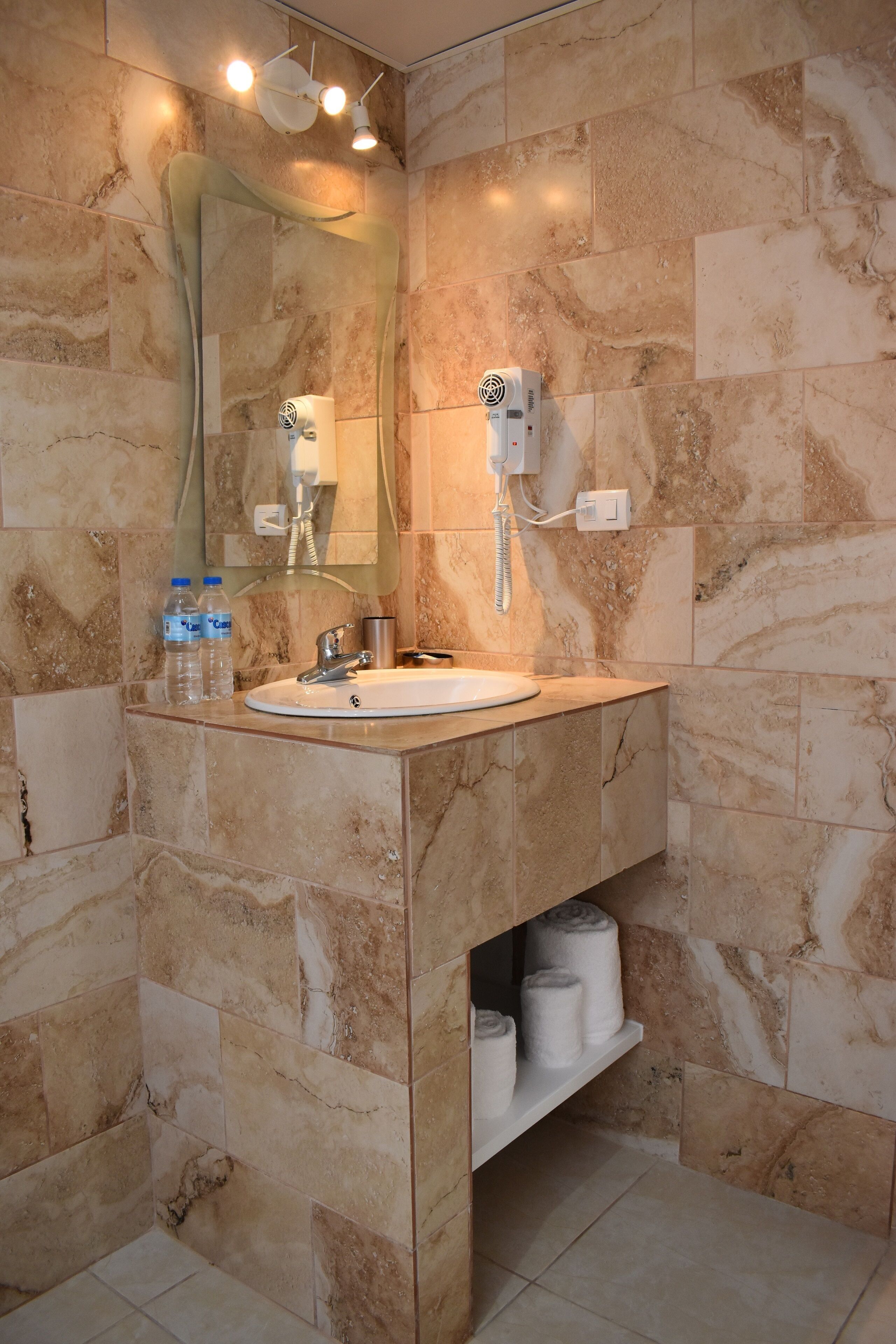 standard double room, 1 king bed, garden view | bathroom | shower, hair dryer, towels, soap