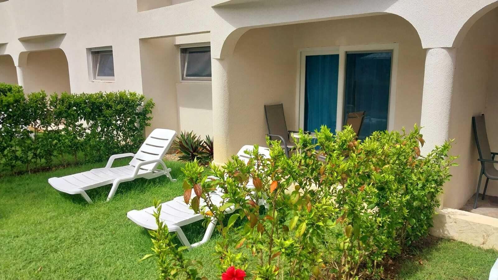 superior twin room, 2 queen beds, pool view | garden view