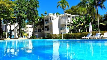 2 outdoor pools, open 8:00 AM to 7:00 PM, pool umbrellas, pool loungers