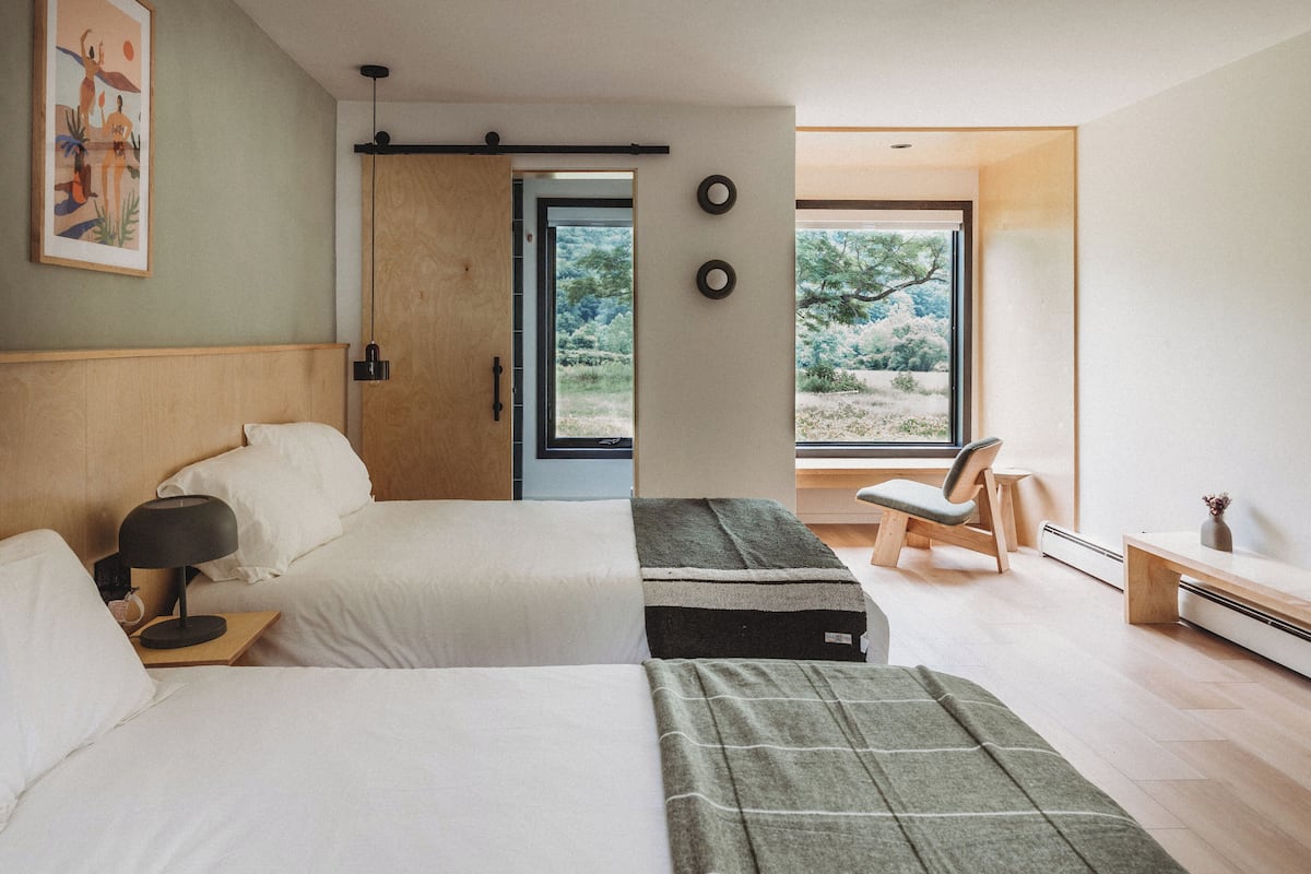 Premium bedding, memory foam beds, desk, laptop workspace